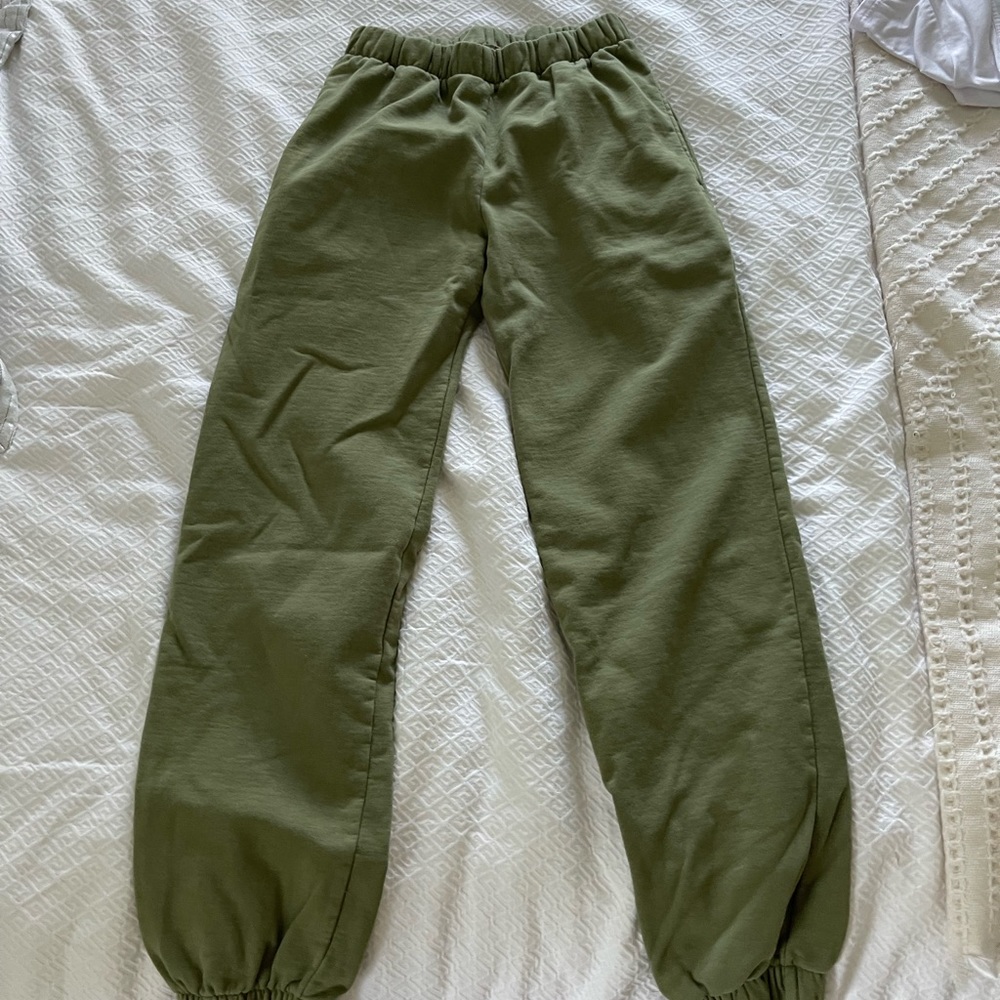Green sweatpants